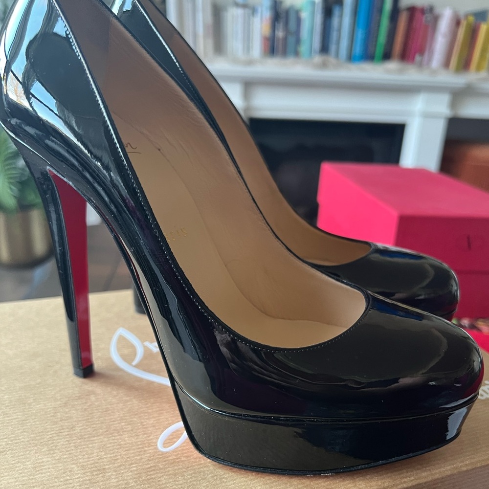 Black platform Louboutins